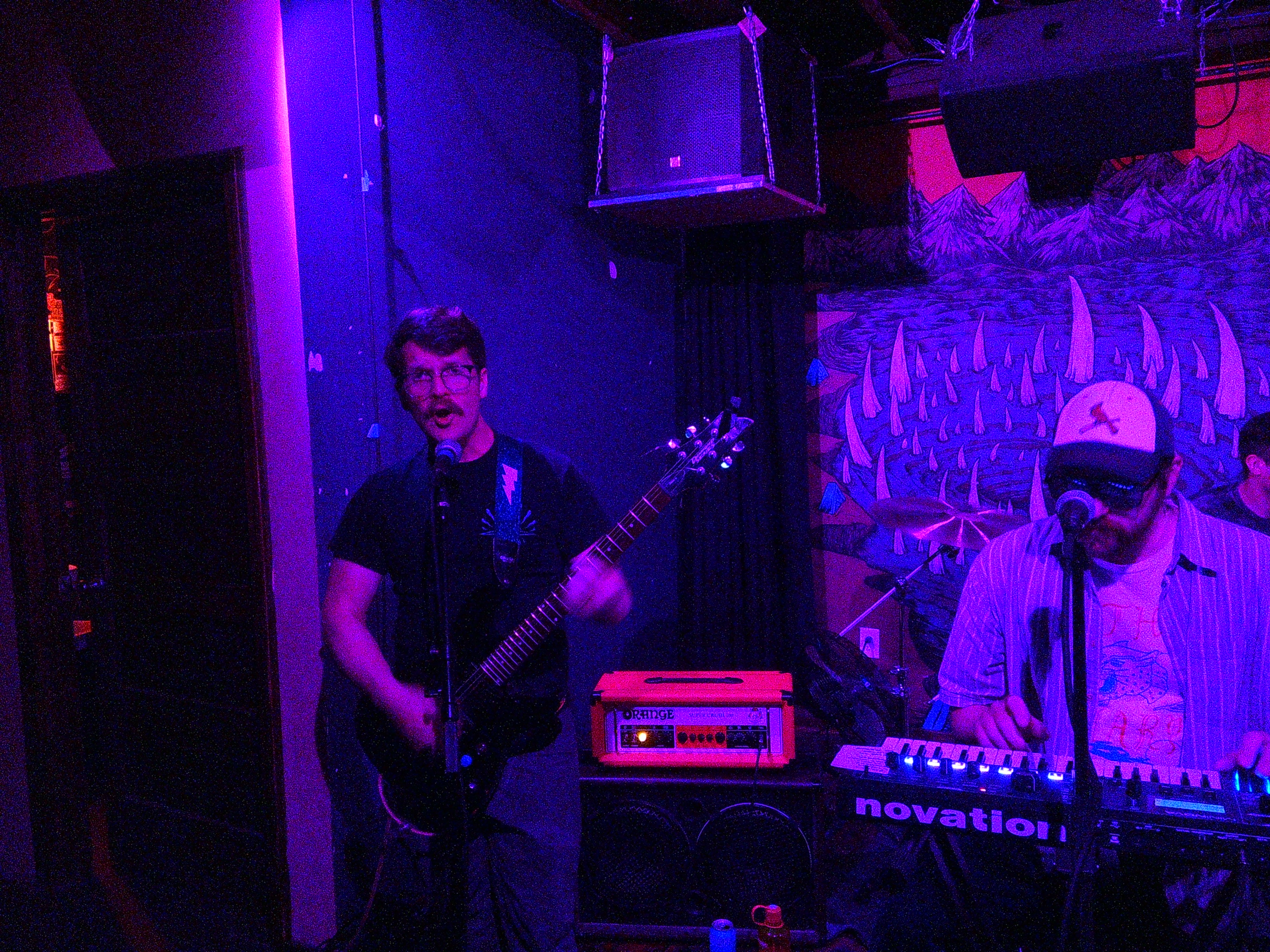 David playing guitar and Ray playing keys