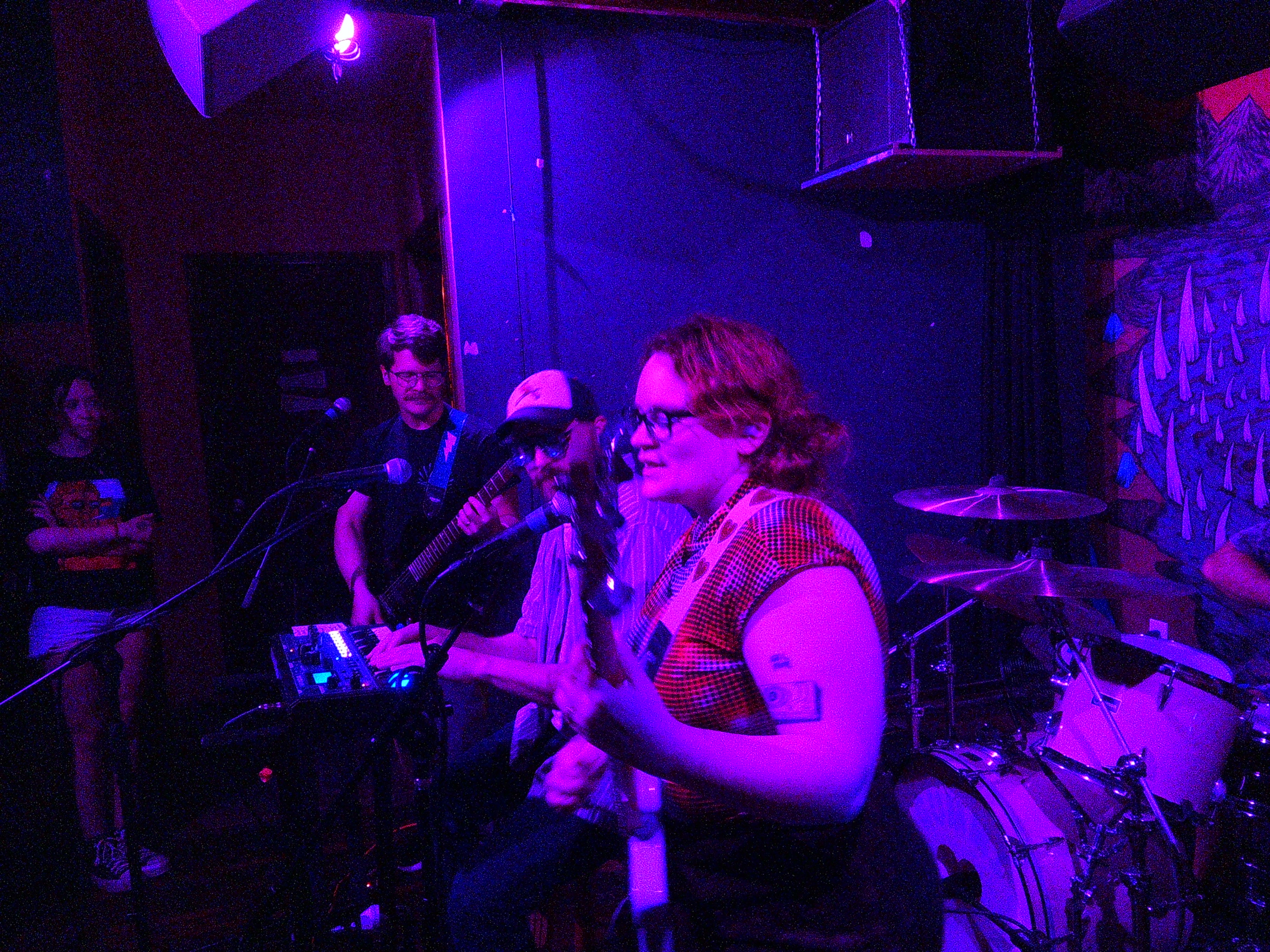 David playing guitar, Ray playing keys, and Haley playing bass